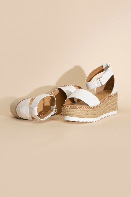 TUCK PLATFORM SANDALS - Shipping only No local pick up